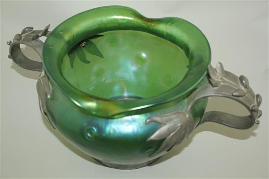 A Loetz style Art Nouveau iridescent green glass and pewter mounted bowl, c.1905, width 44cm
